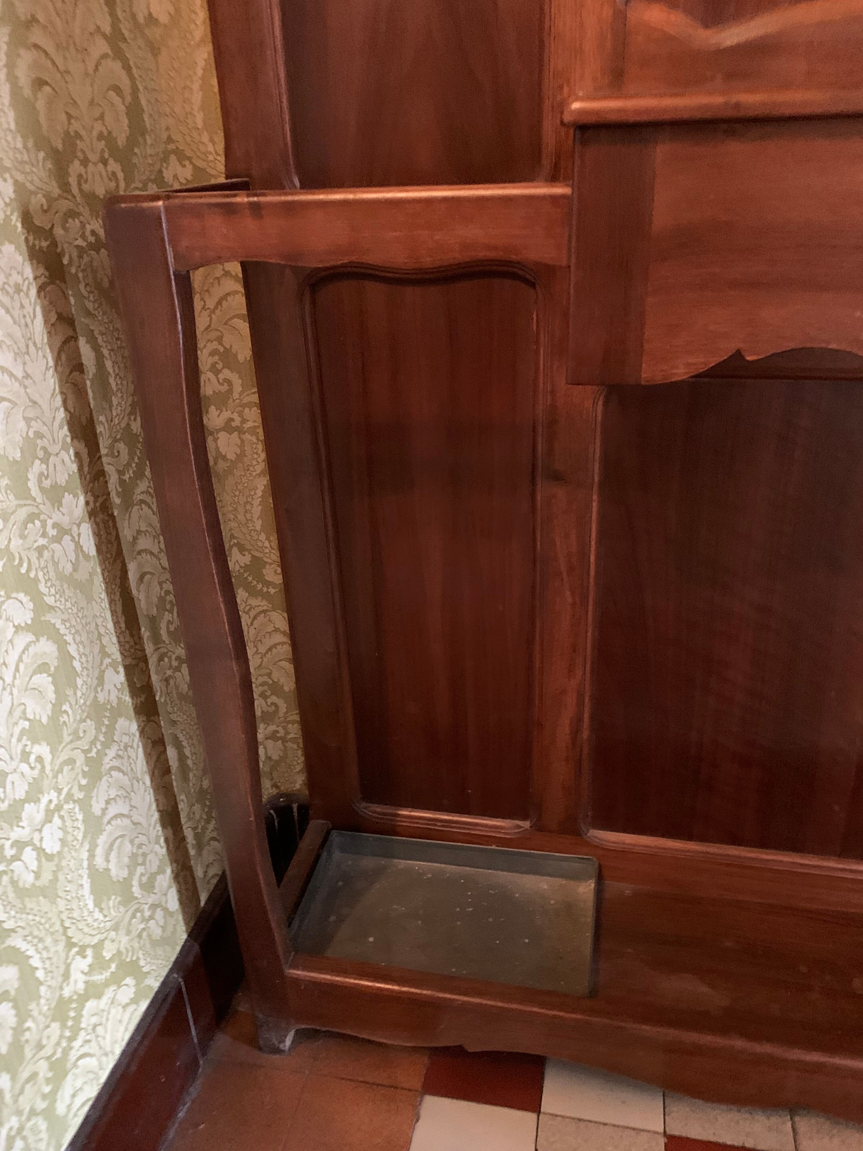 Cloakroom with walnut coat holder