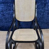 Beautiful rocking chair in the style of Thonet in blackened curved wood