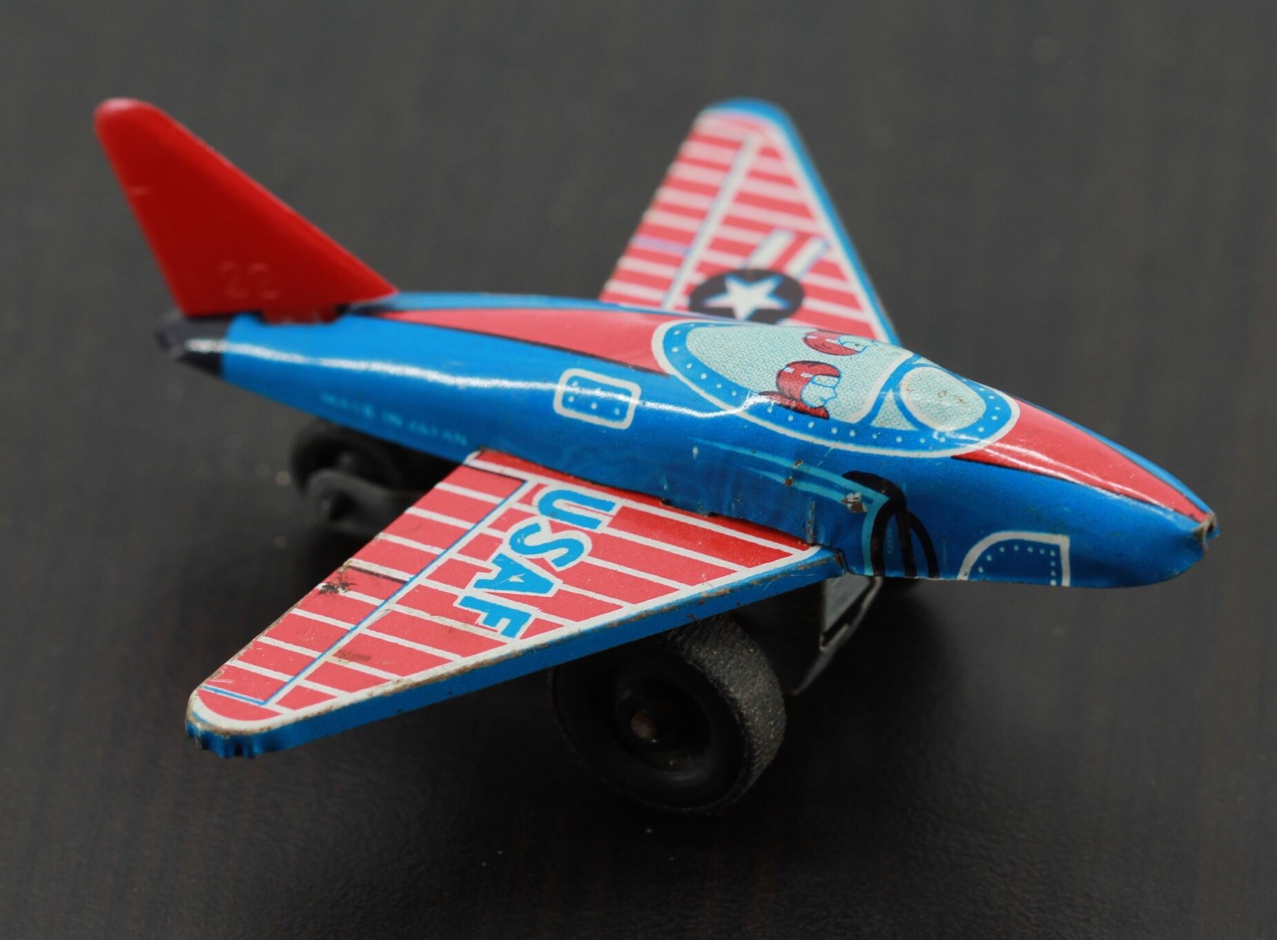old aircraft toy in sheet metal usaf