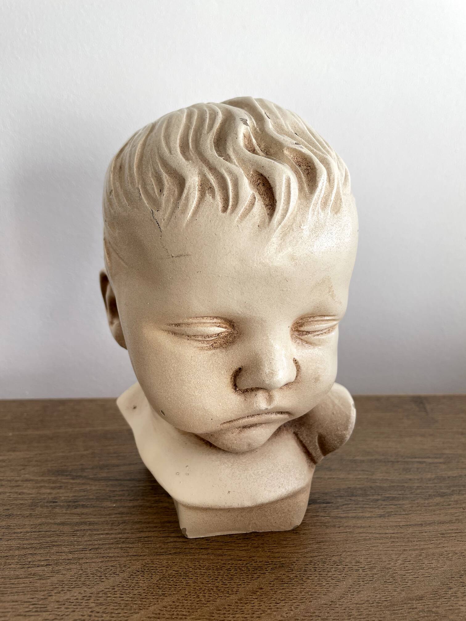 Child bust made from resin by Antoine Paridon, signed 240 A.P.