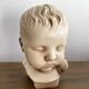 Child bust made from resin by Antoine Paridon, signed 240 A.P.