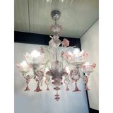 Chandelier in transparent and pink Murano-style glass with flower and leaf.