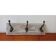 Wooden hanger in a rustic style.