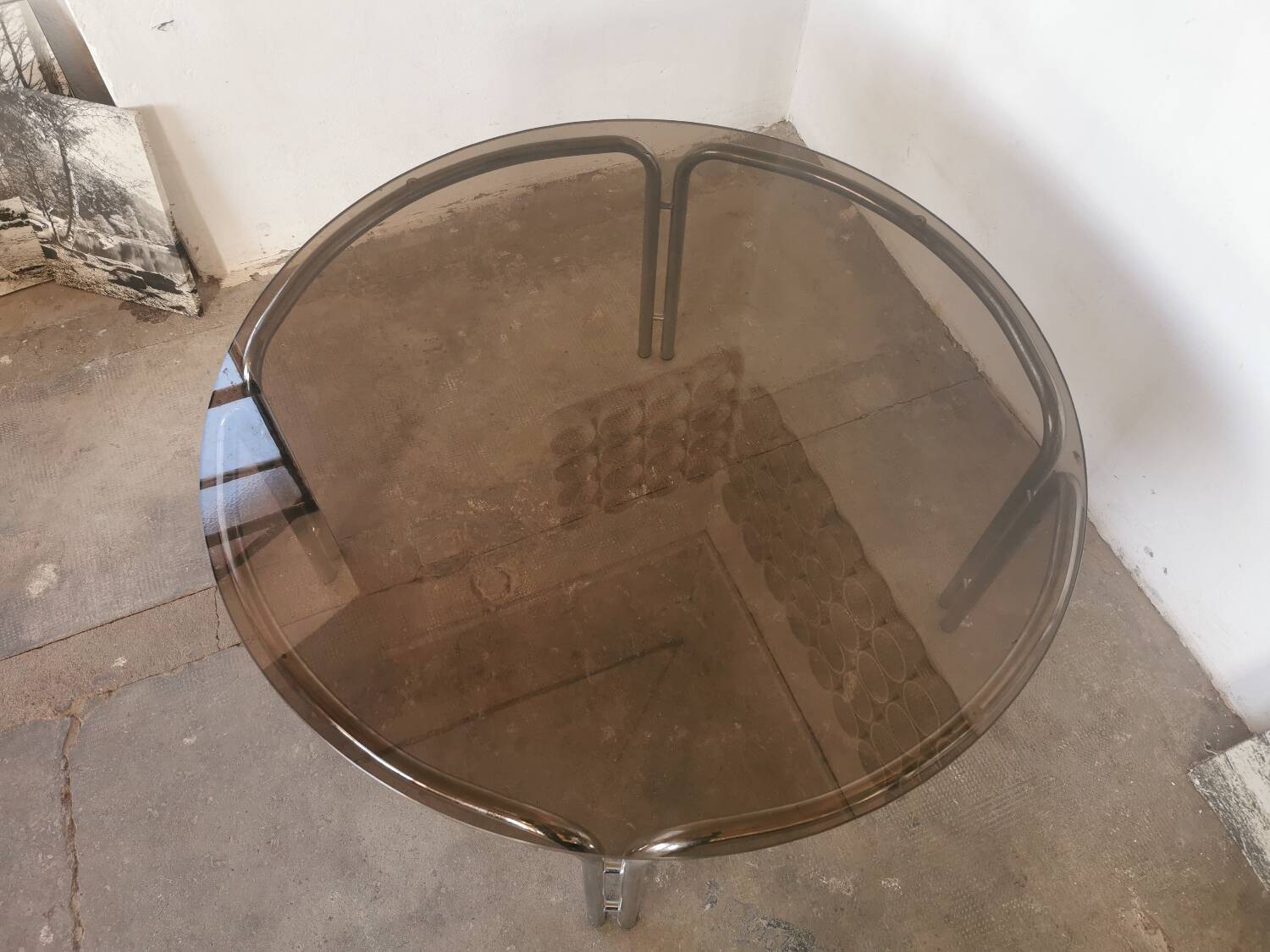 Round chrome and smoked glass coffee table
