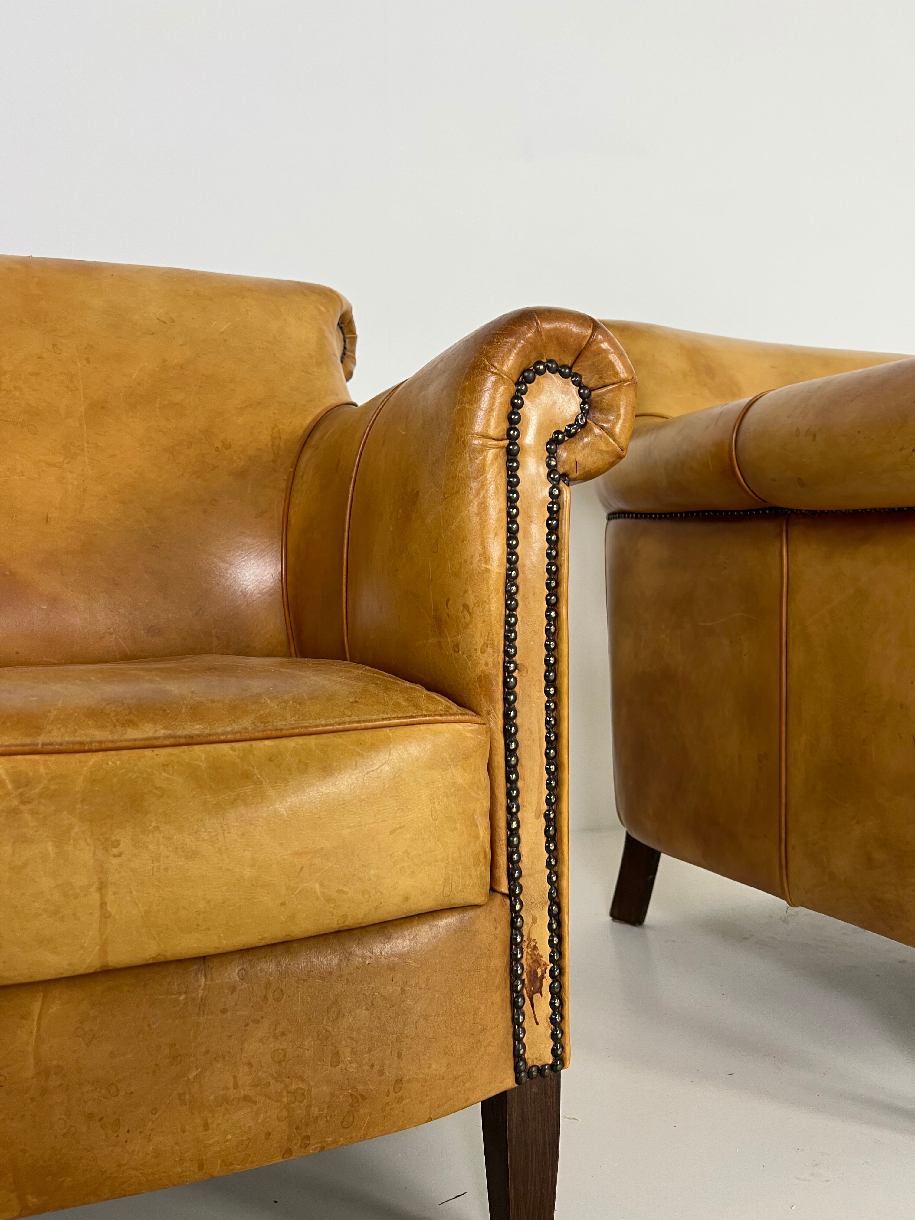 Ensemble de 2 fauteuils club en cuir