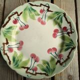 Old decorative plate in barbotine by luneville cherry motif