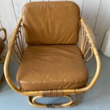 Pair of leather and bamboo armchairs
