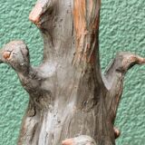 Lamp base in sculpted terracotta featuring birds, signed.