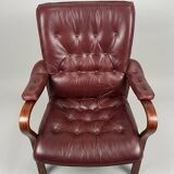 Scandinavian armchair with footrest