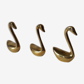 Brass swans