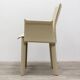Beige leather chair with armrests