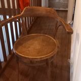 Curved wood armchair
