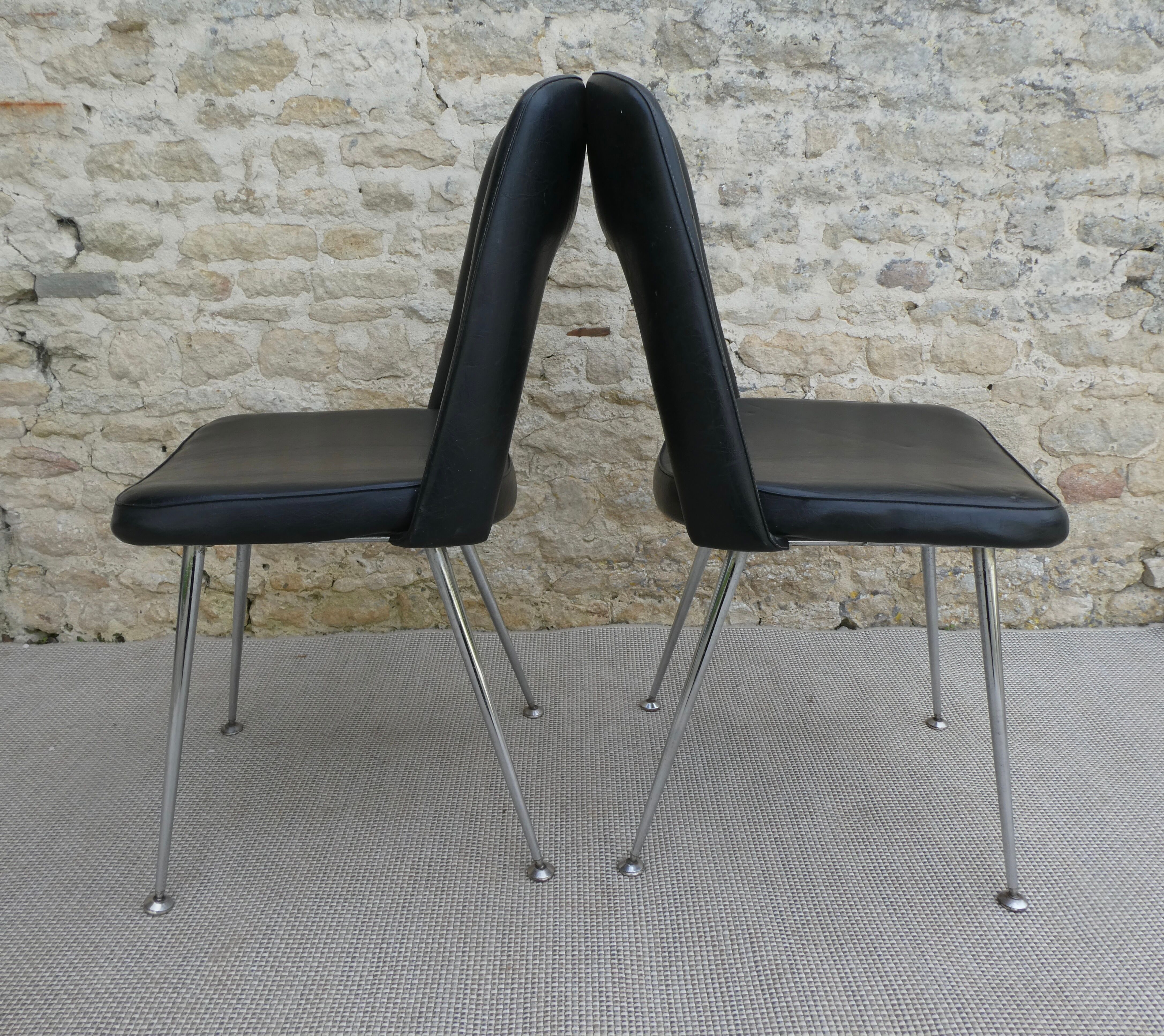 Pair of office chairs in chromed metal and skaï, 60s