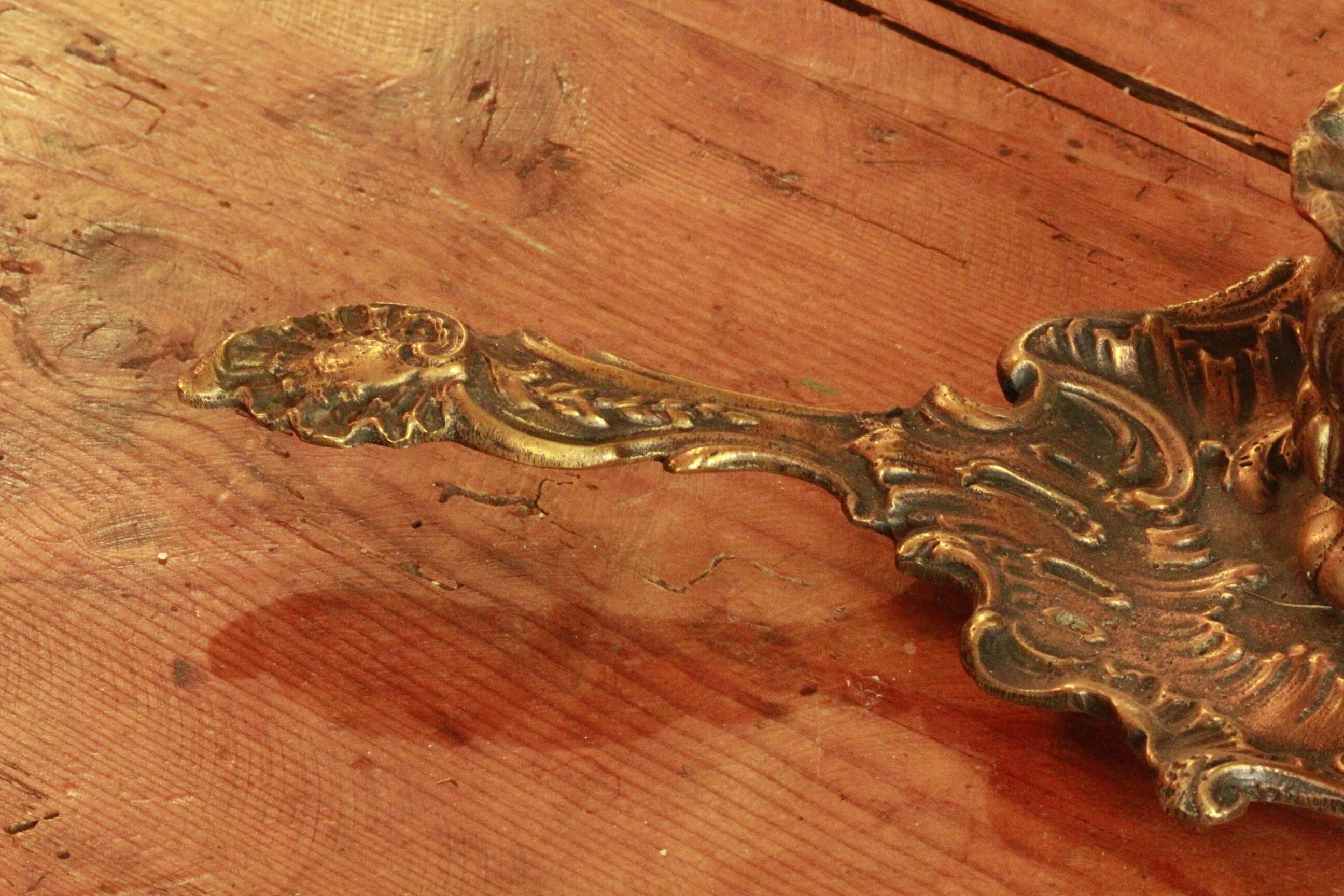 Old hand candle holder