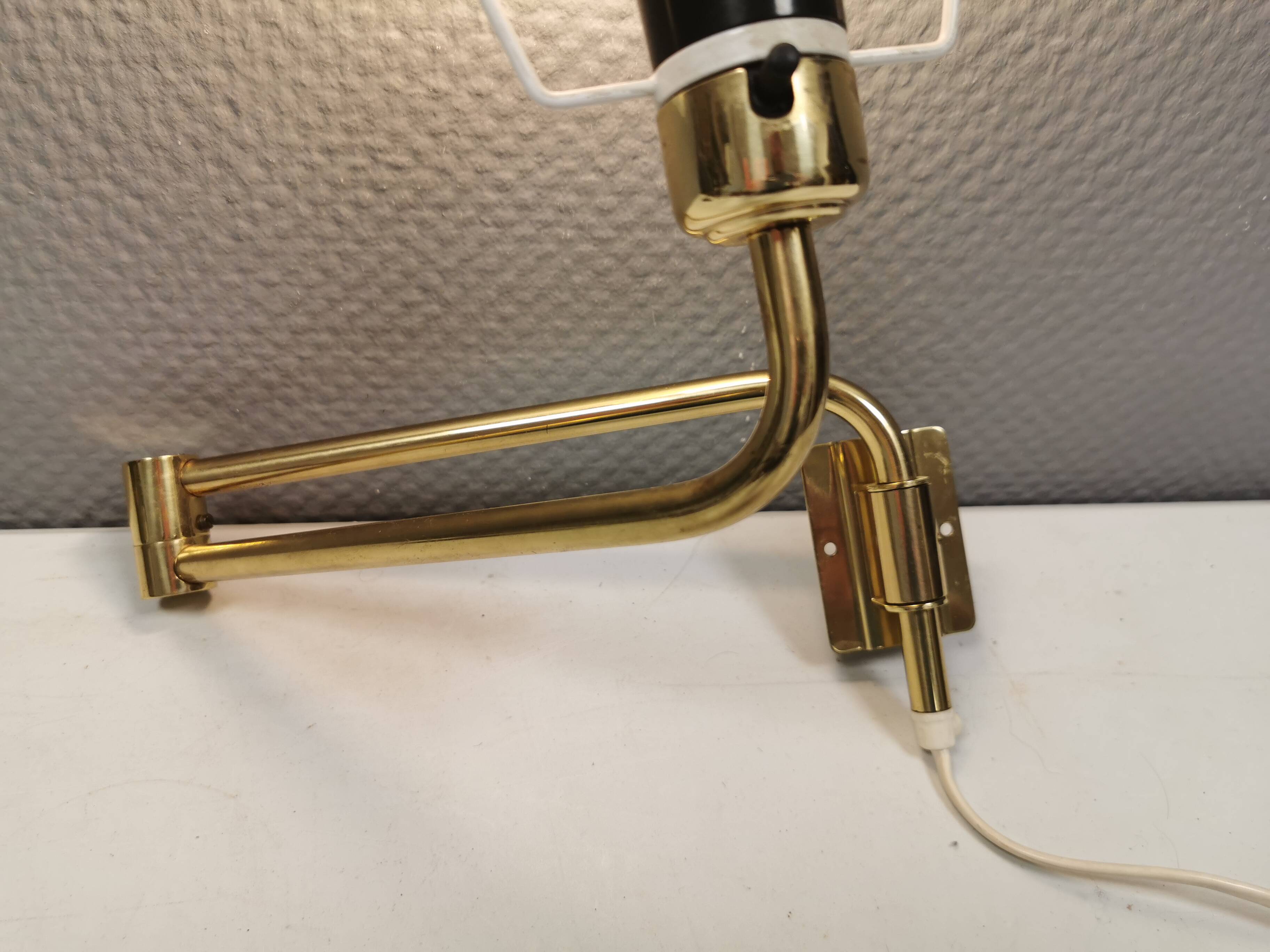 Danish “swing arm” wall lamp in brass by Lyskaer Lightning (LB) 1980s.