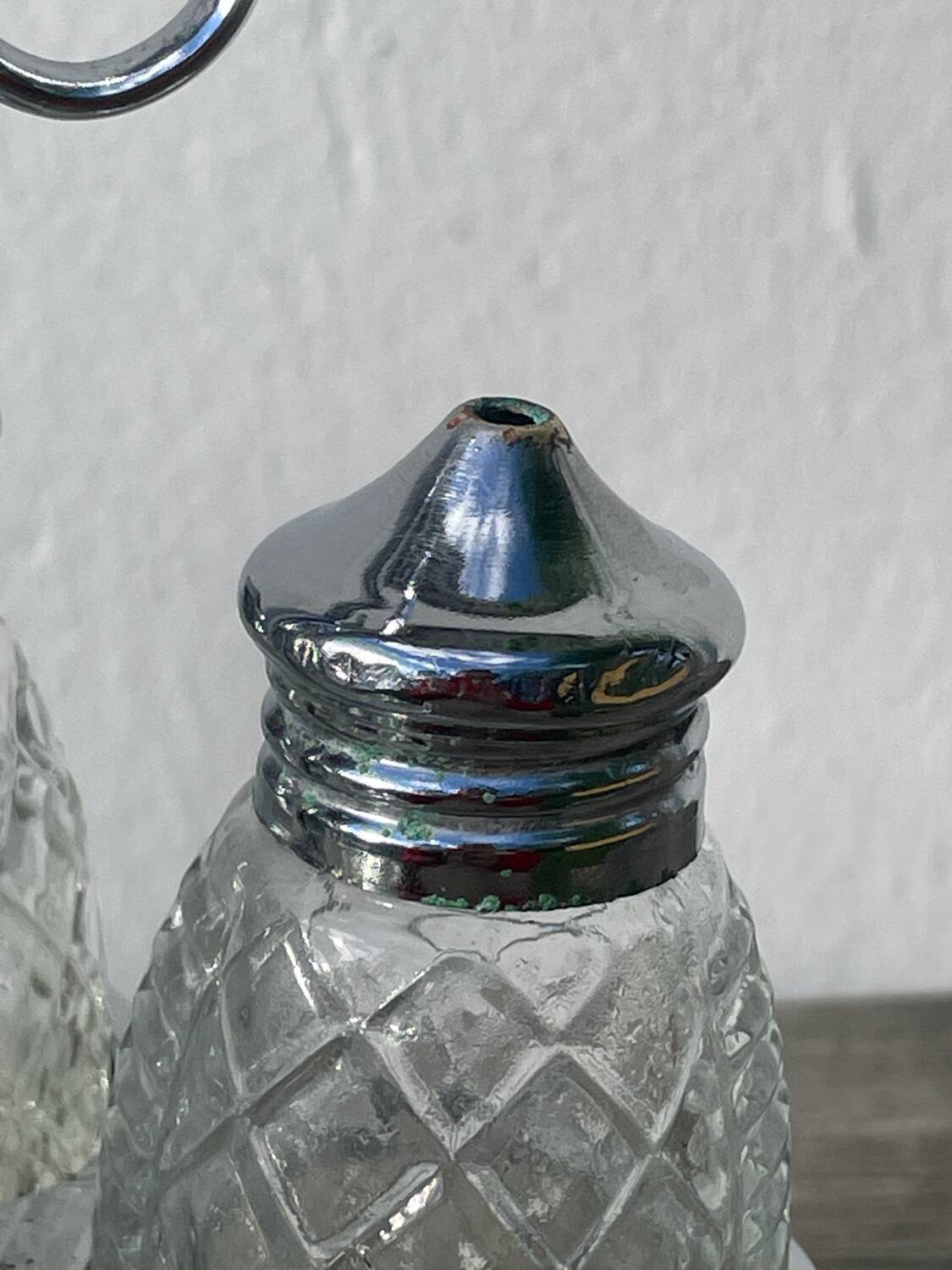 Silver-plated metal and glass salt and pepper shakers