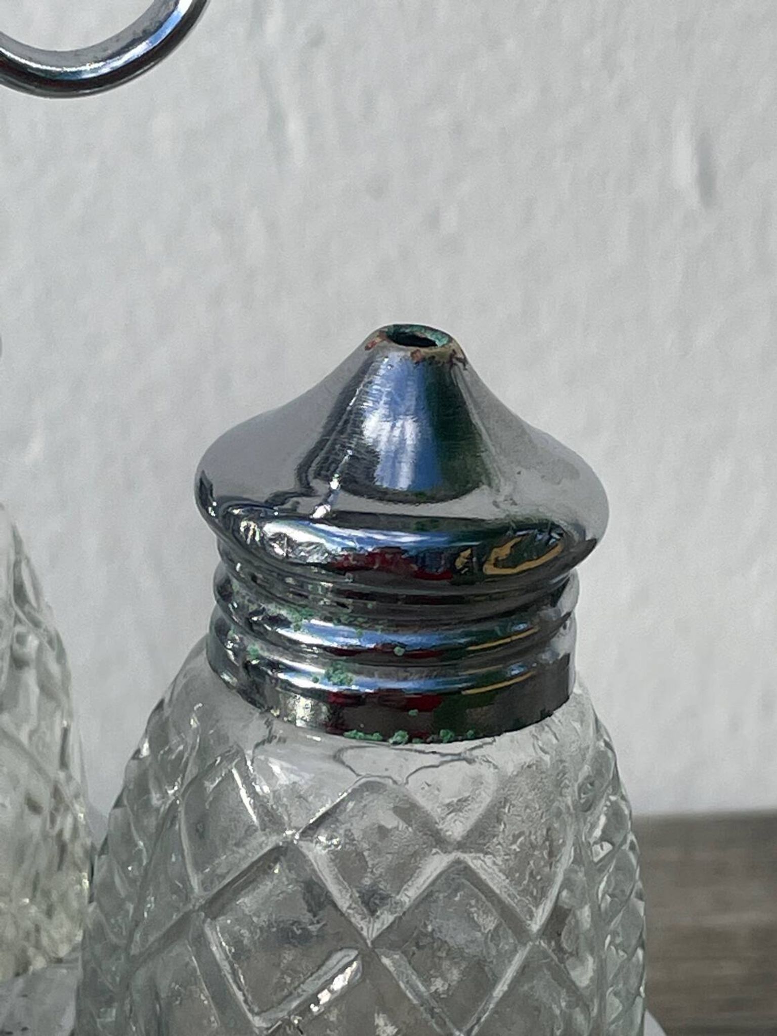 Silver-plated metal and glass salt and pepper shakers