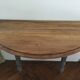 Antique painted wooden half-moon console table