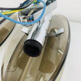 Pair of smoked glass and chrome wall lights from the 1970s.