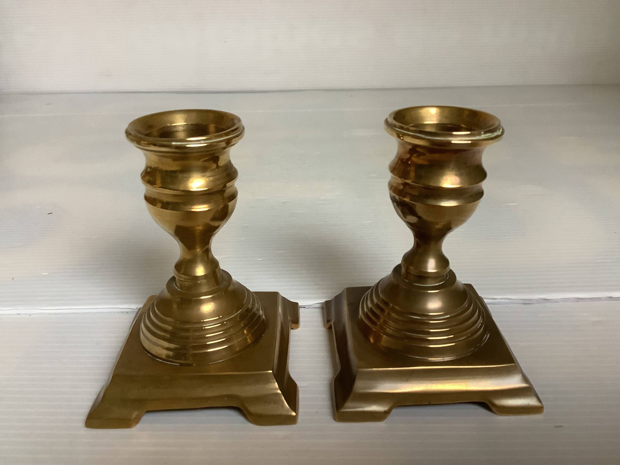 Pair of small brass candle holders