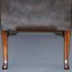 Gainsborough armchair George II leather Chesterfield hand-carved with claw and ball feet.