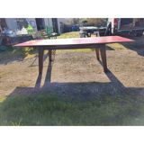 1960s oak dining table with integrated extensions.