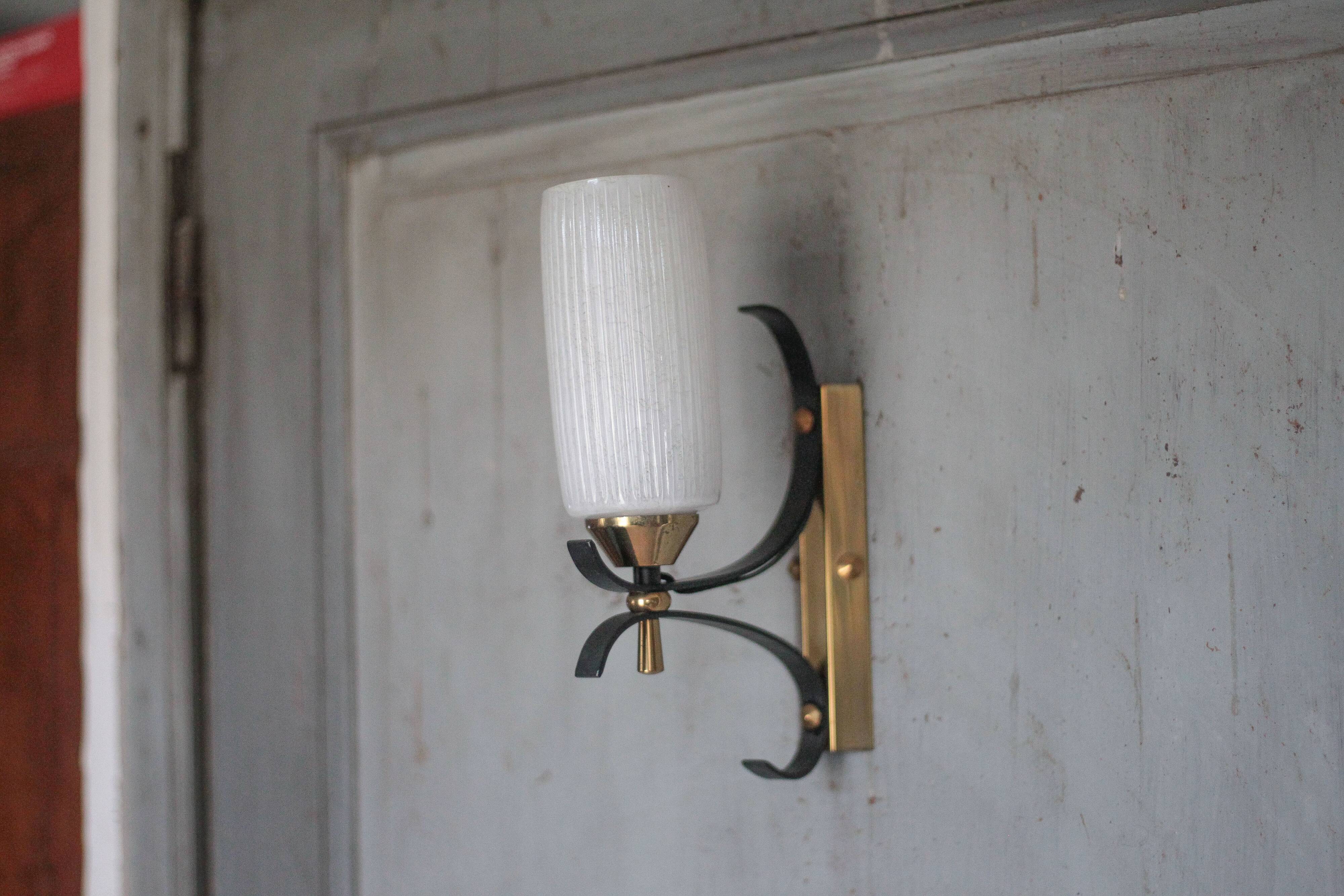 Vintage brass and iron wall light from the 1960s, Arlus.