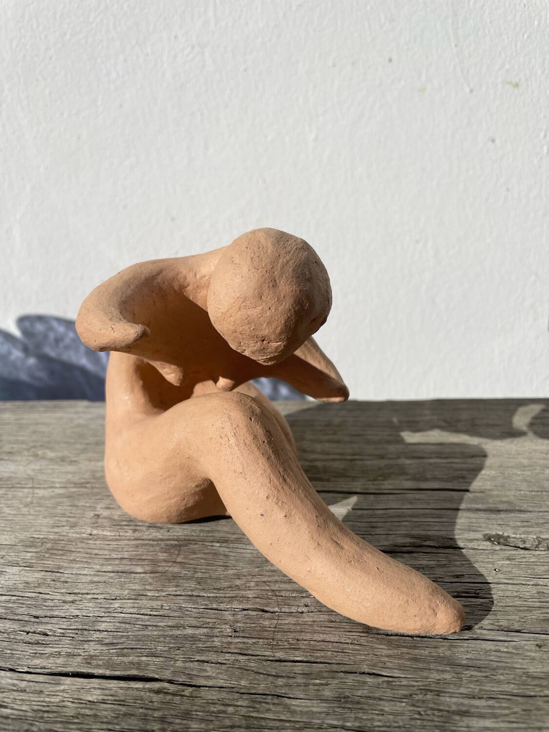 Terracotta sculpture figurine of a woman