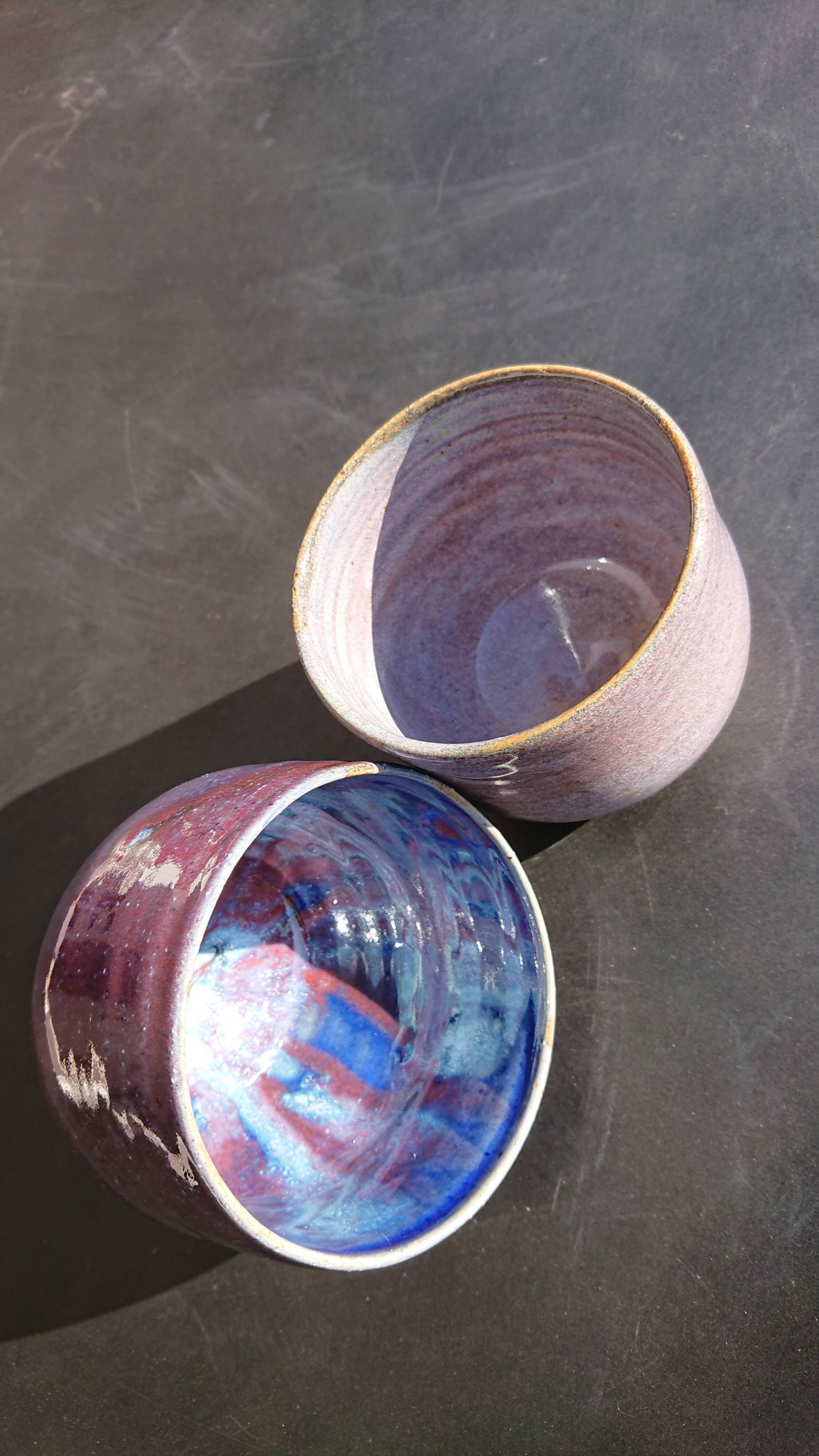Purple enamelled sandstone potduo signed