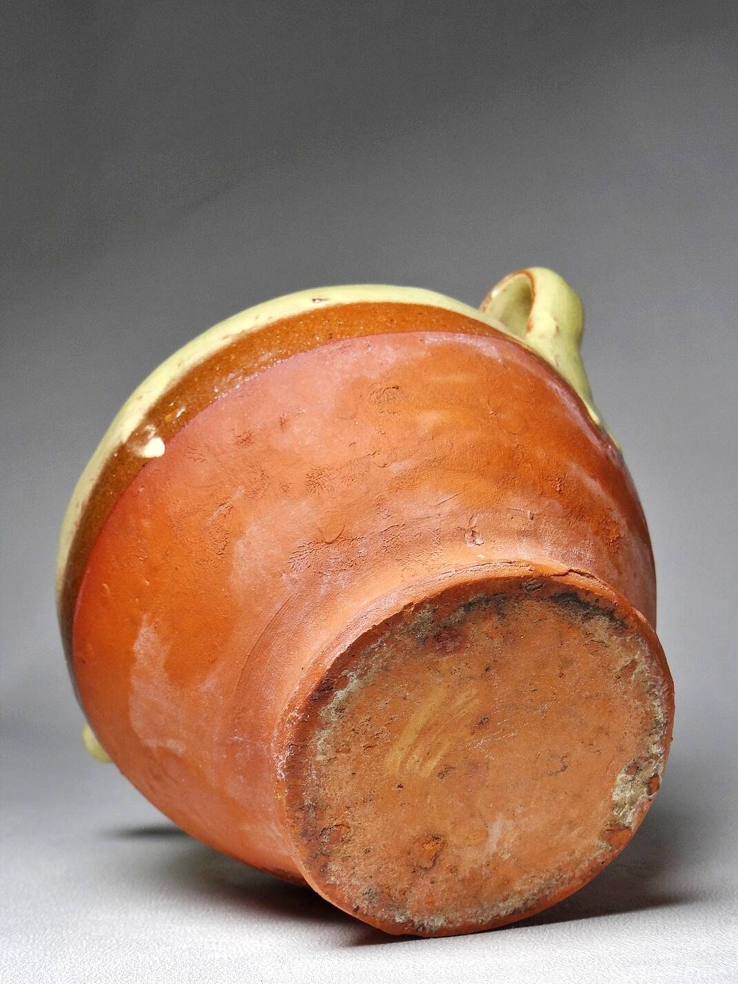 Small vintage pale yellow enamelled terracotta goat jug