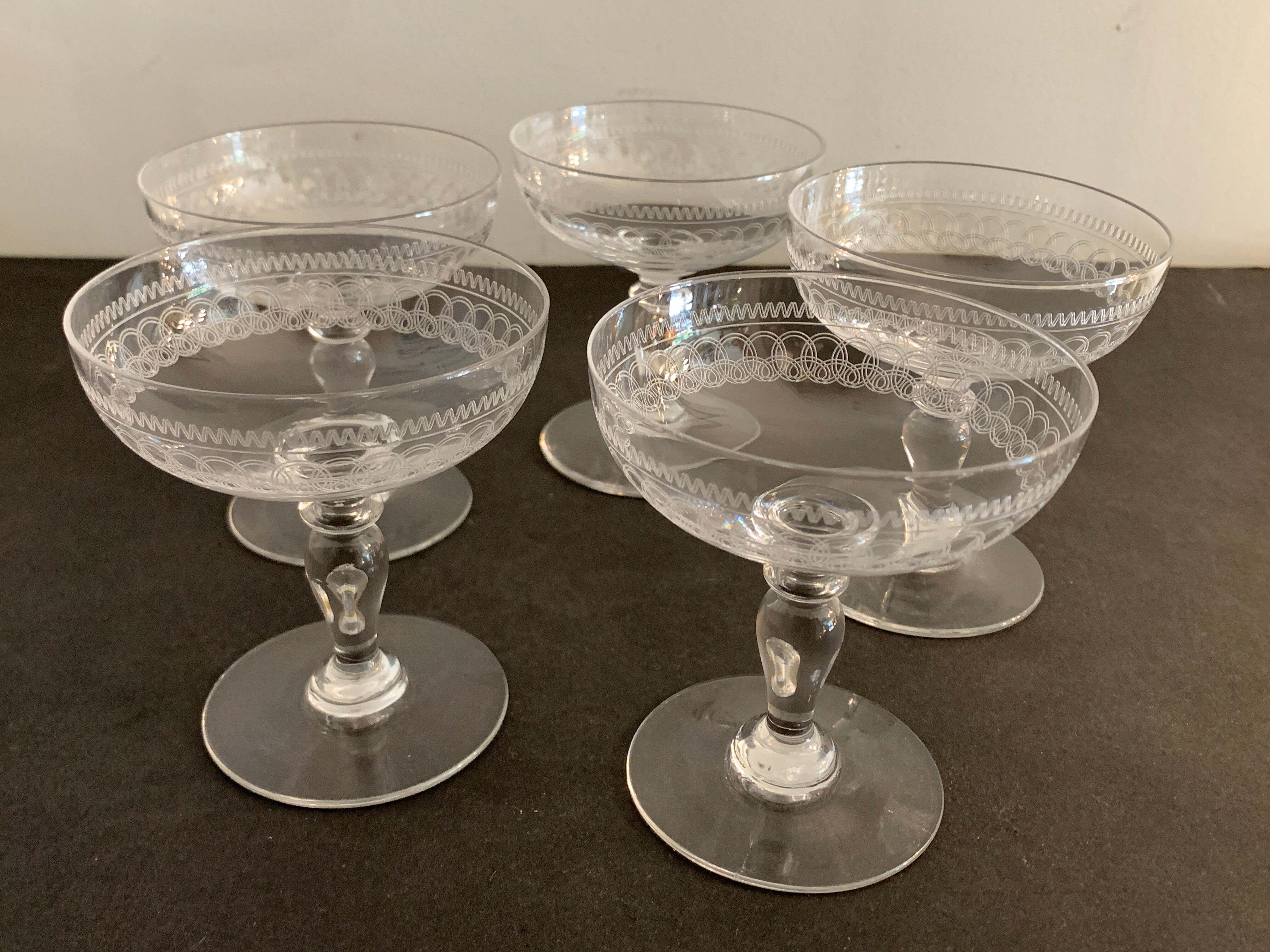 5 antique champagne glasses in engraved crystal