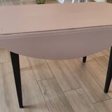 Old restored table with shutters with 4 legs