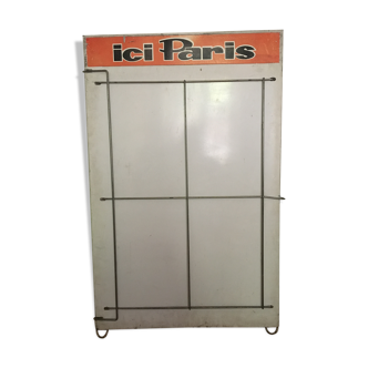 Newspapers in jail, "ici paris" straggling