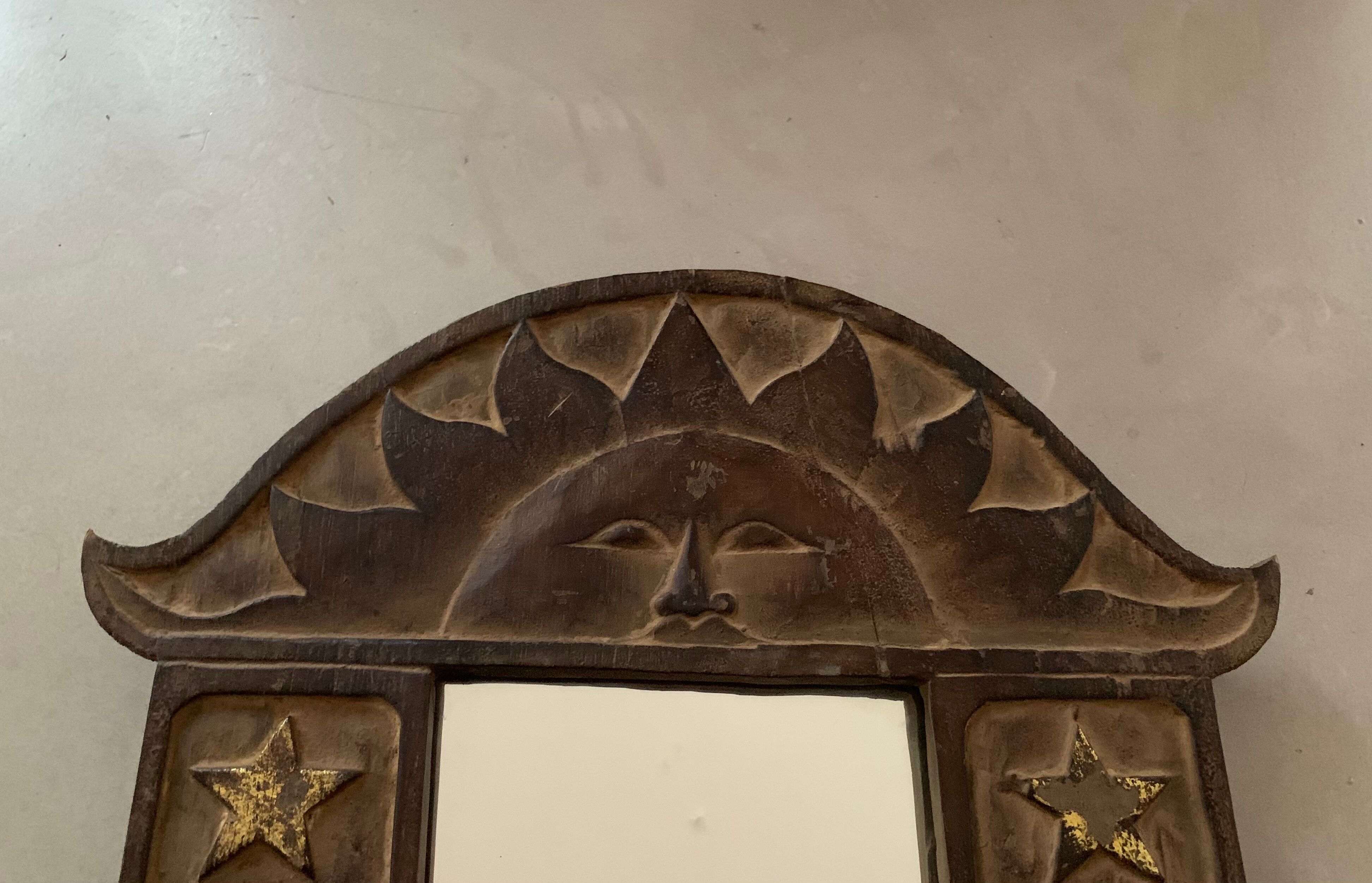 Antique carved wooden mirror