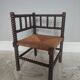 Turned wooden corner chair