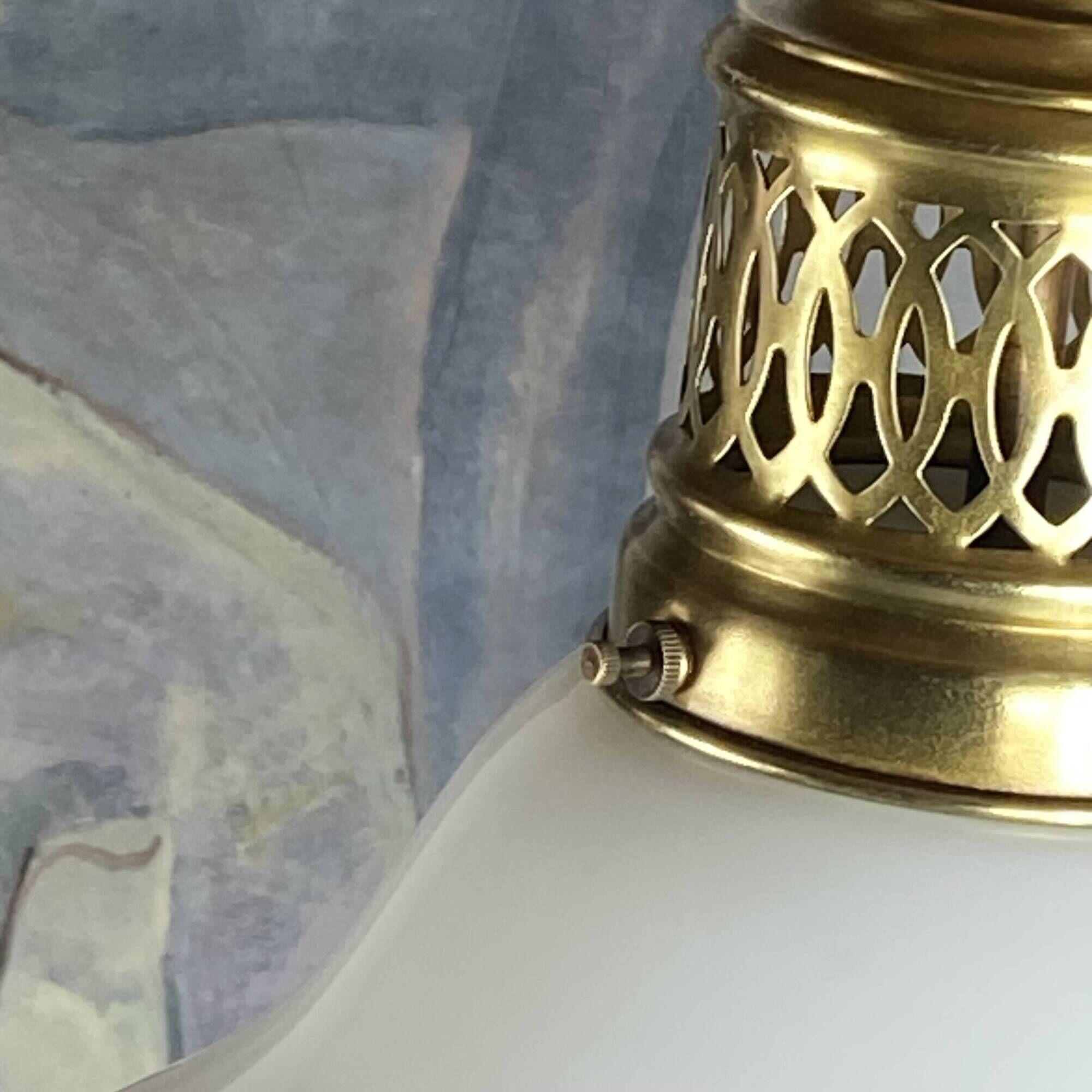 Suspension in white opaline glass and brass 1920 with a gilded brass chain.