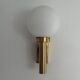 Large minimalist cinema wall light in opal glass and heavy brass, 1960s, Germany