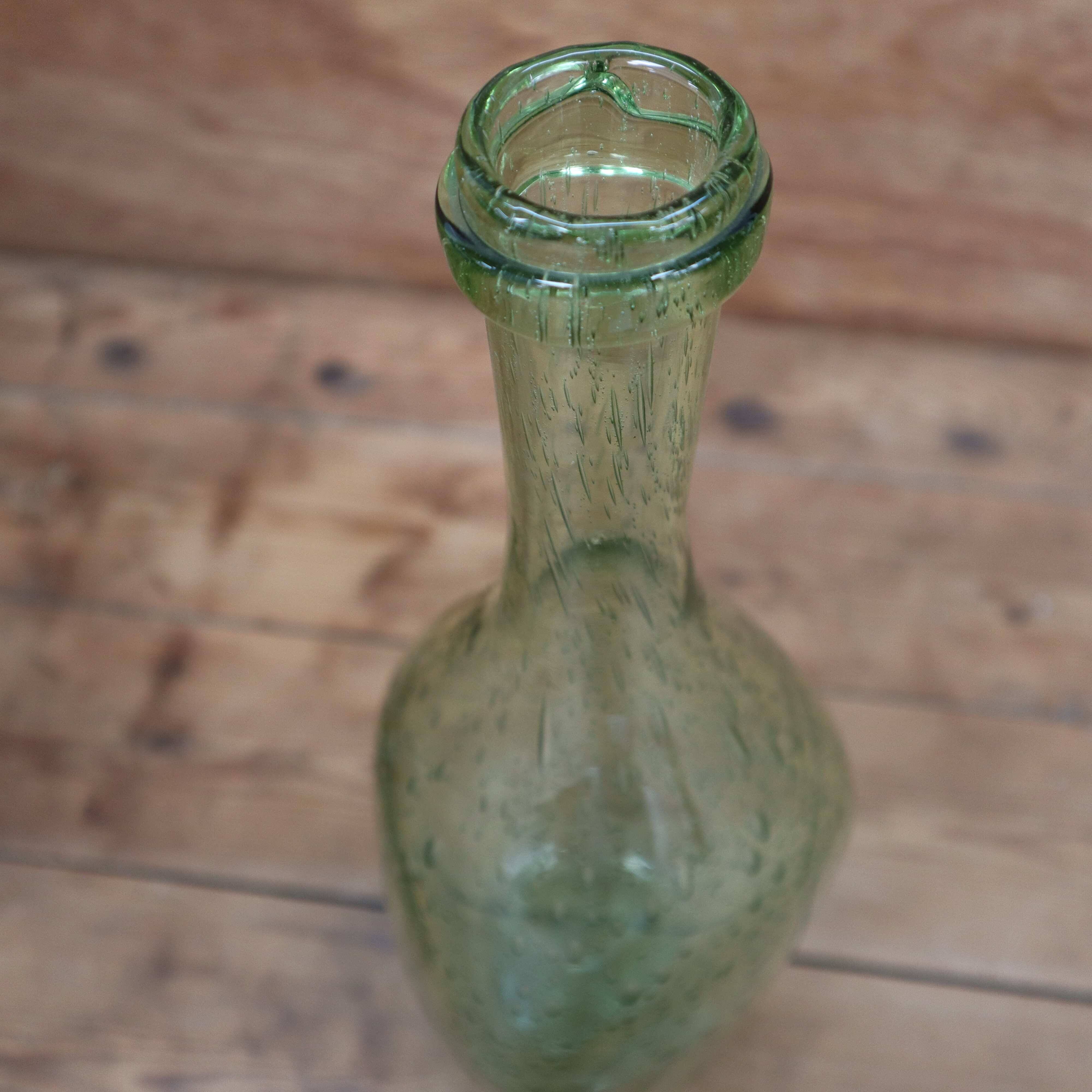 Biot water green colored bubble blown glass bottle