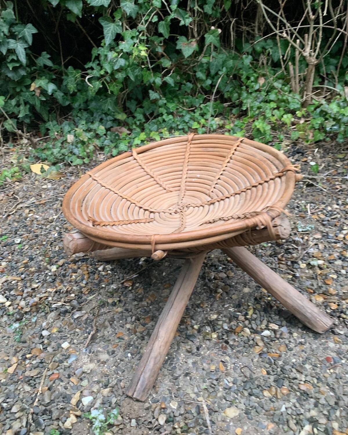 Rattan armchair and pouf