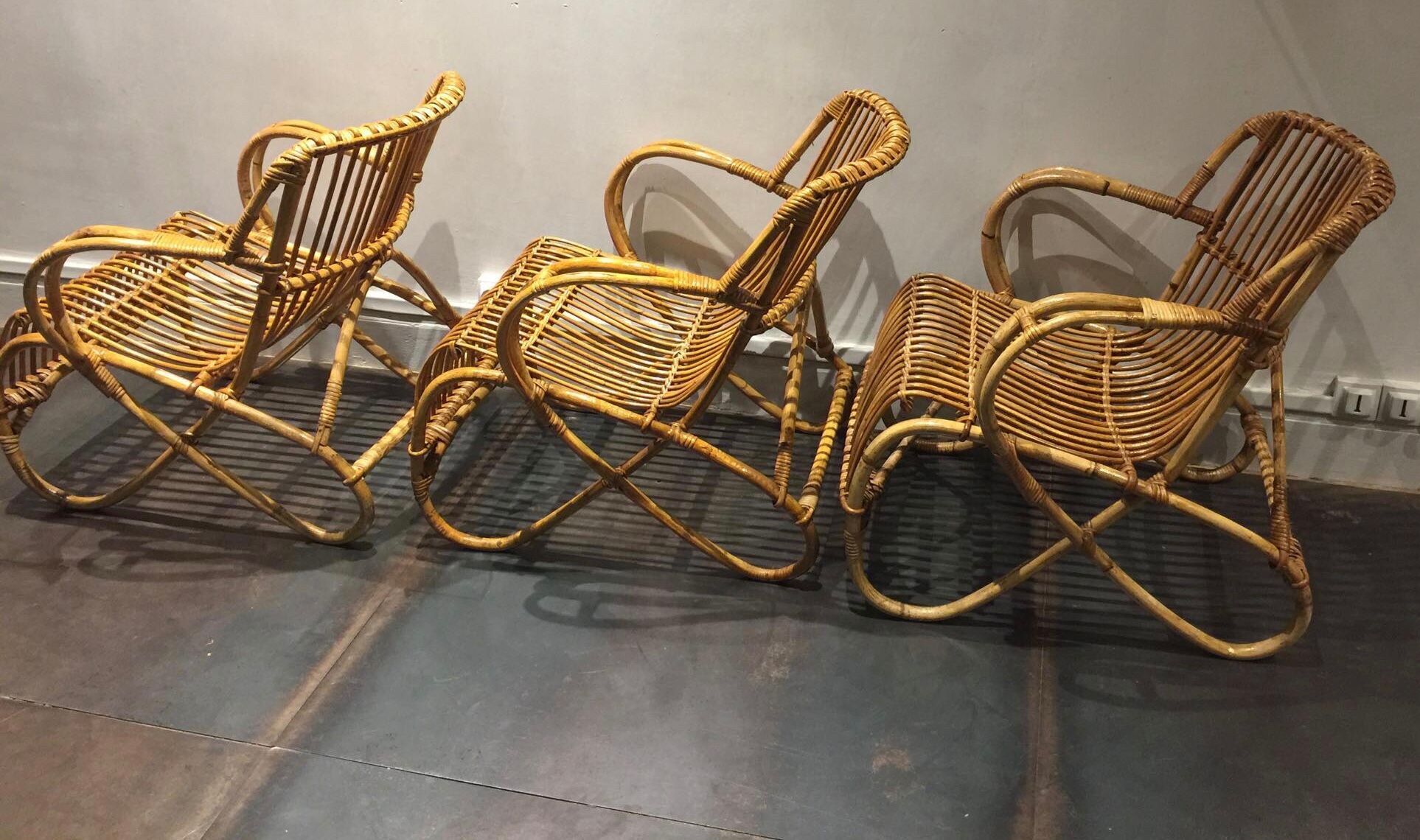 Set de trois fauteuils en rotin