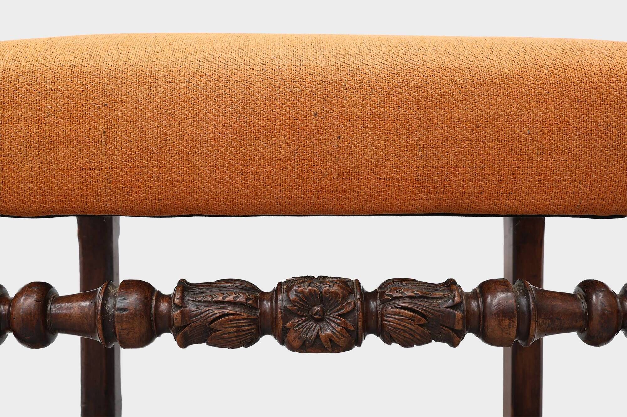 Louis XIII walnut stool with carved turned stretchers and upholstered seat