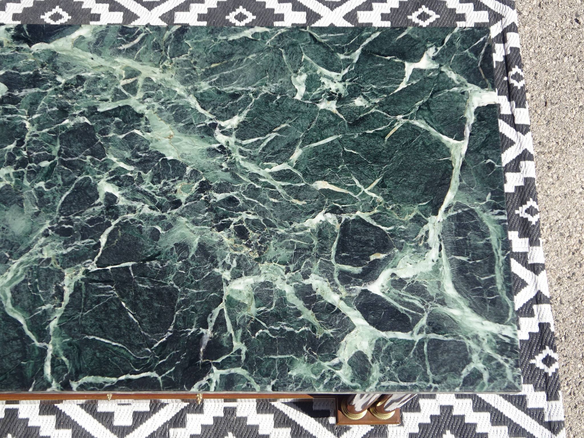 Flamed mahogany enfilade with sea green marble in Empire style.