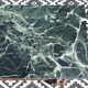 Flamed mahogany enfilade with sea green marble in Empire style.