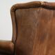 Set of two light cowhide wingback armchairs with a timeless English look