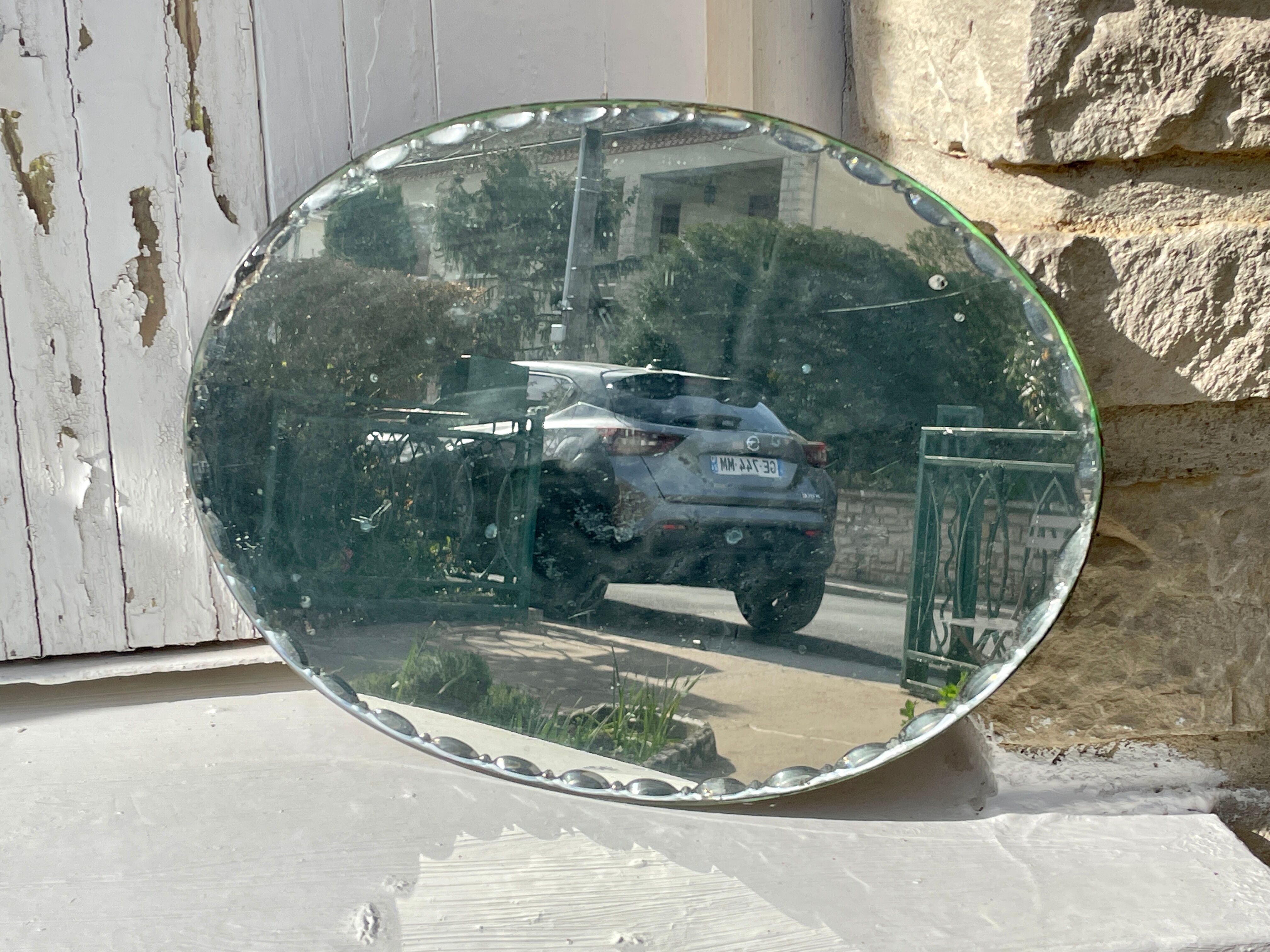 Vintage beveled mirror with mercury