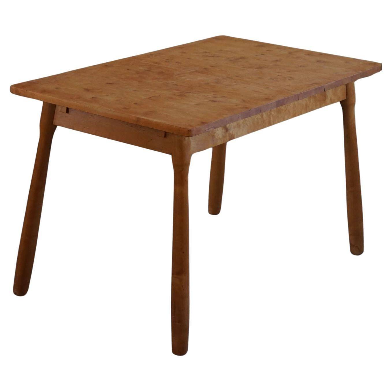 Modern Danish birch desk/dining table attributed to Philip Arctander, 1940s.