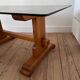 Pine coffee table with smoked glass top.