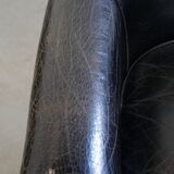 Black grained cowhide leather armchair