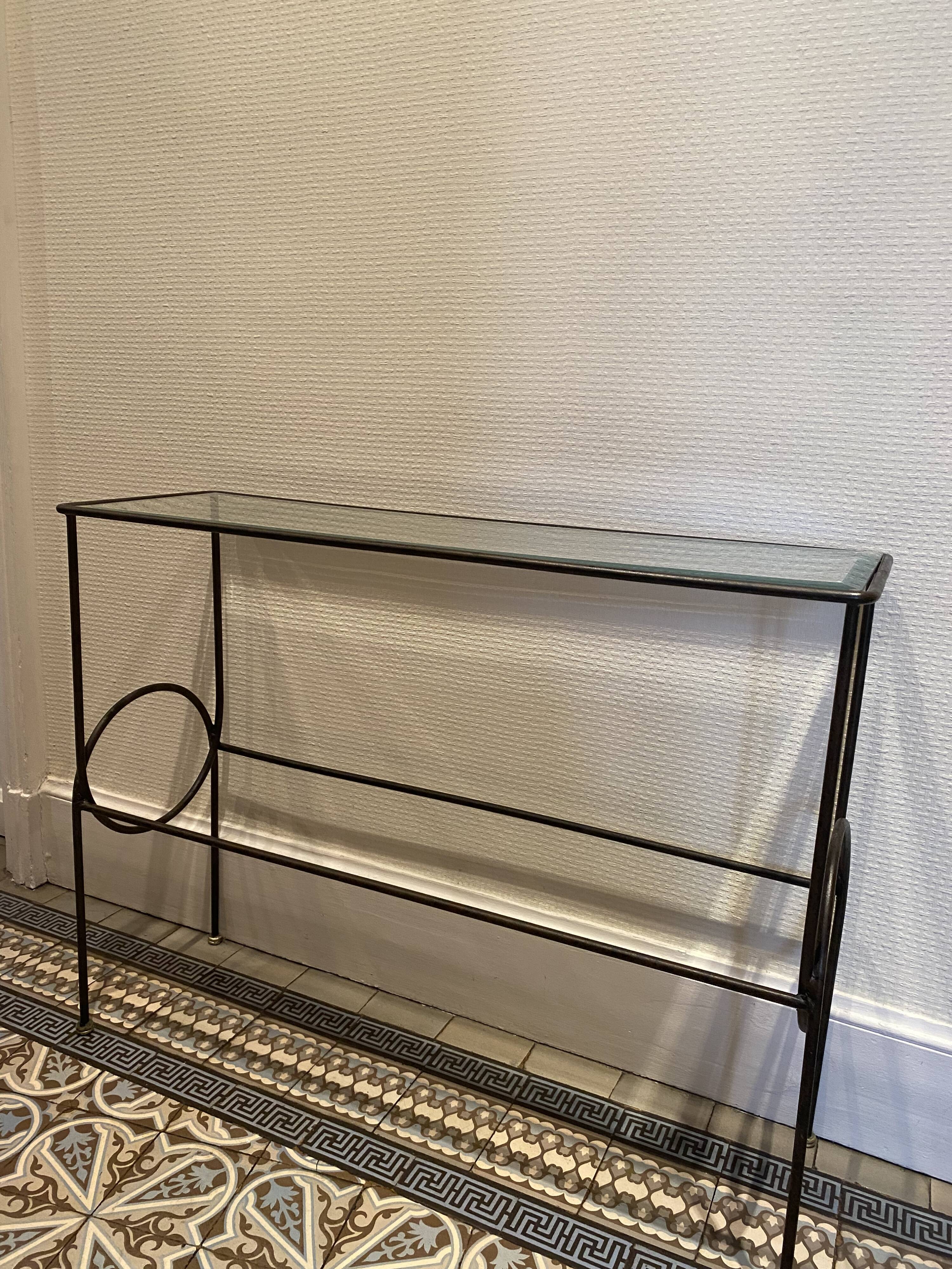 Green console and wrought iron