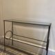 Green console and wrought iron